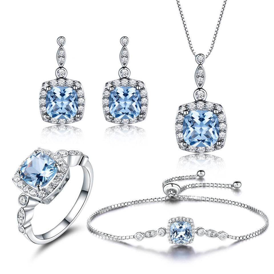 Elegant 925 Sterling Silver Sky Blue Topaz 4-Piece Jewelry Set - Subtle Shine Jewelry Co.