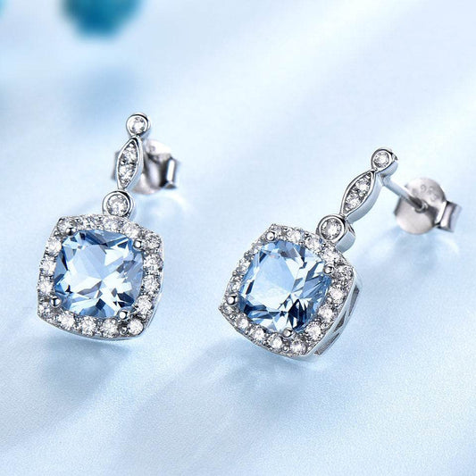 Elegant 925 Sterling Silver Sky Blue Topaz 4-Piece Jewelry Set - Subtle Shine Jewelry Co.